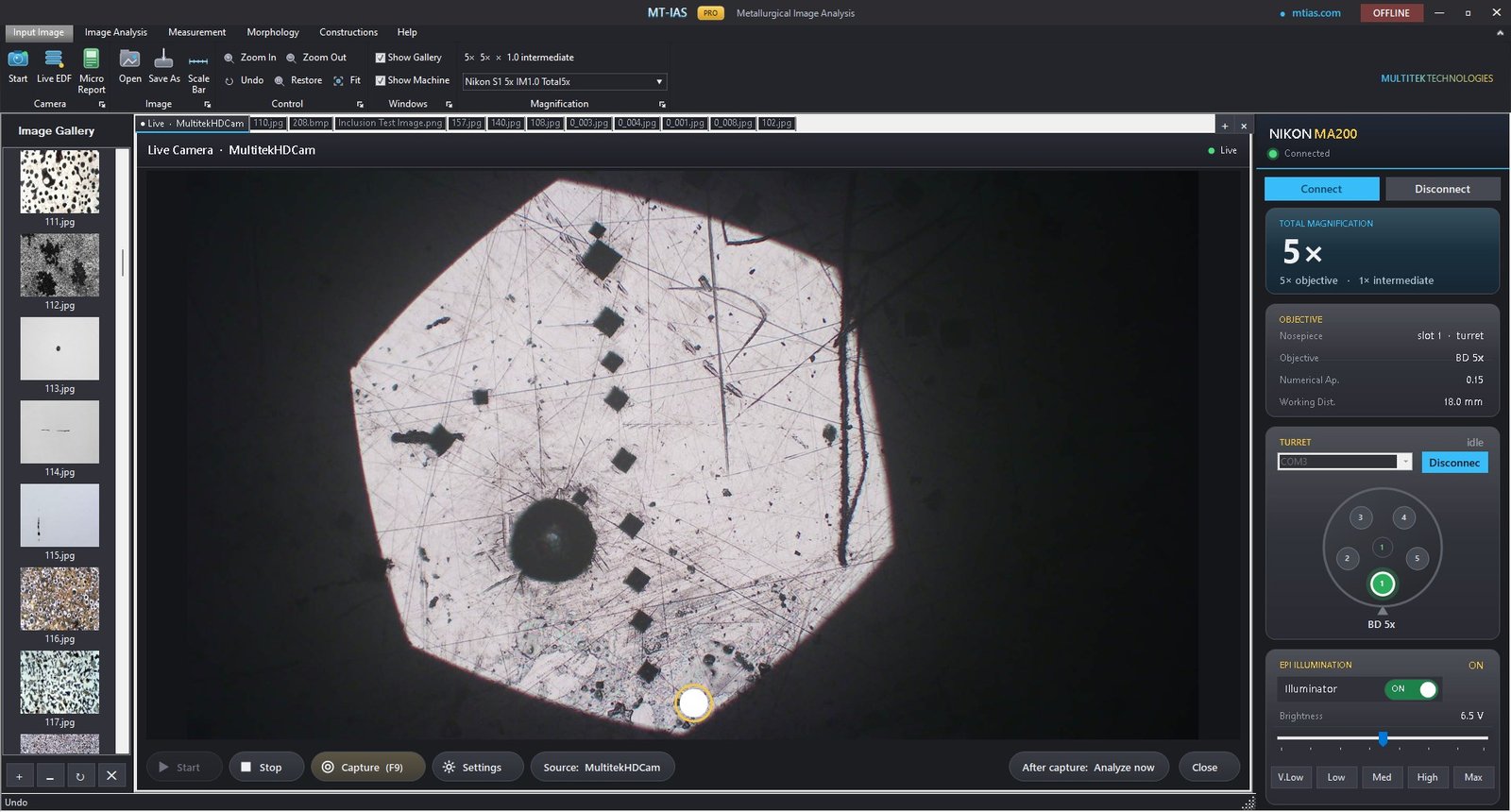 MT-IAS Pro live camera workspace: the Live Camera tab streaming from MultitekHDCam with the round on-screen shutter and Capture F9 button, After capture set to Analyze now, and the connected Nikon MA200 panel showing turret slot 1, BD 5x objective and its illumination preset at 6.5 V